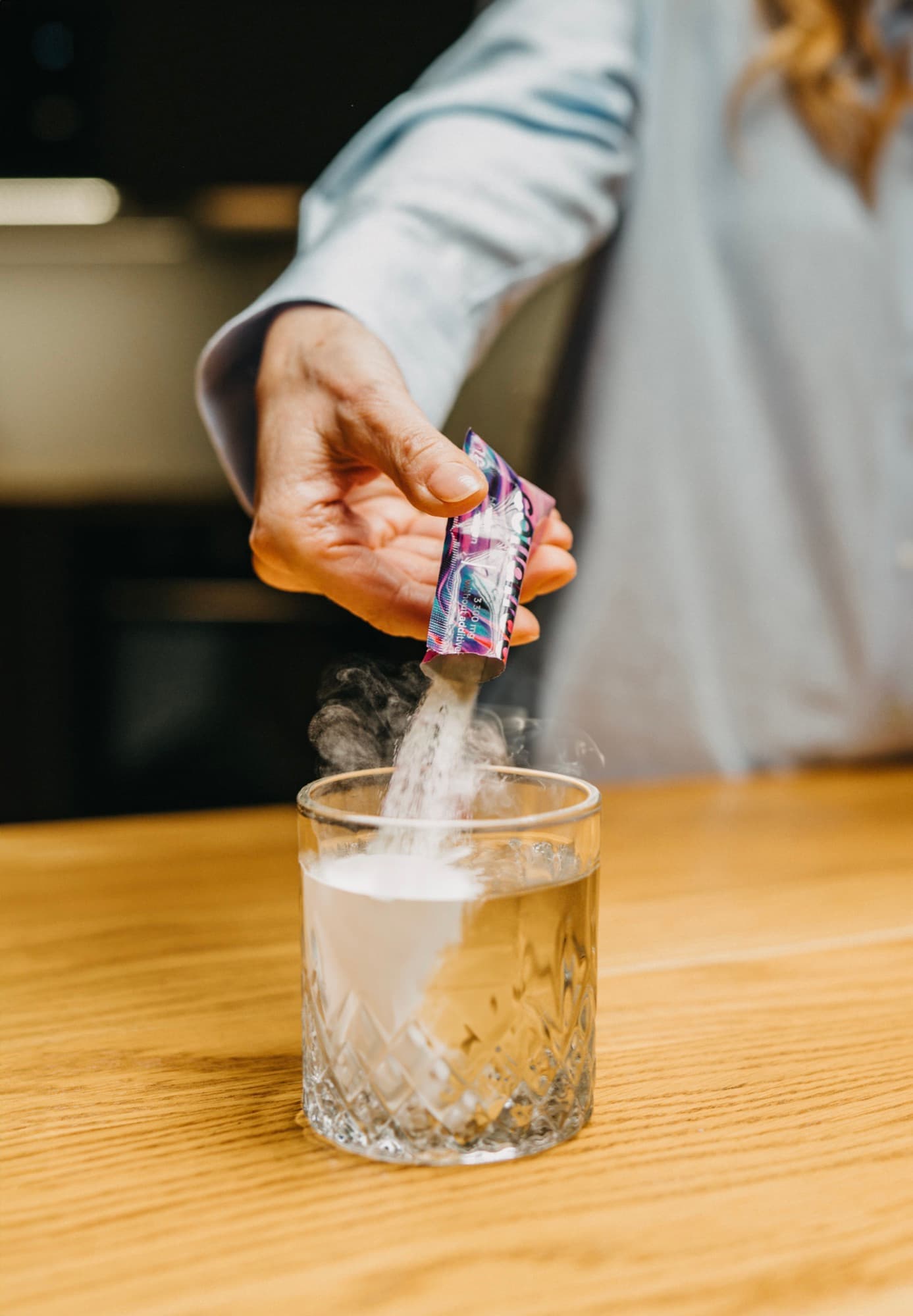 collalloc sachet dissolved in a glass of water